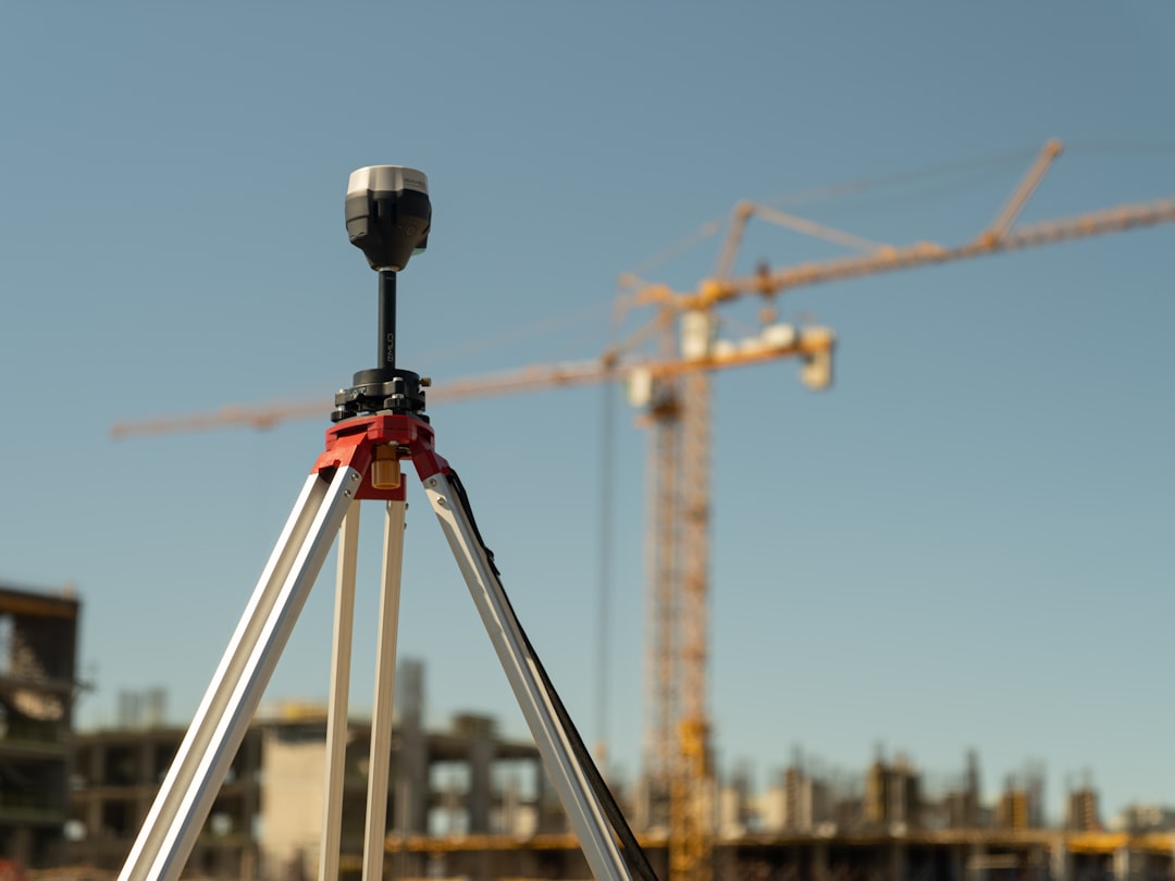 GPS land surveying equipment in the field with satellite technology and civil construction precision