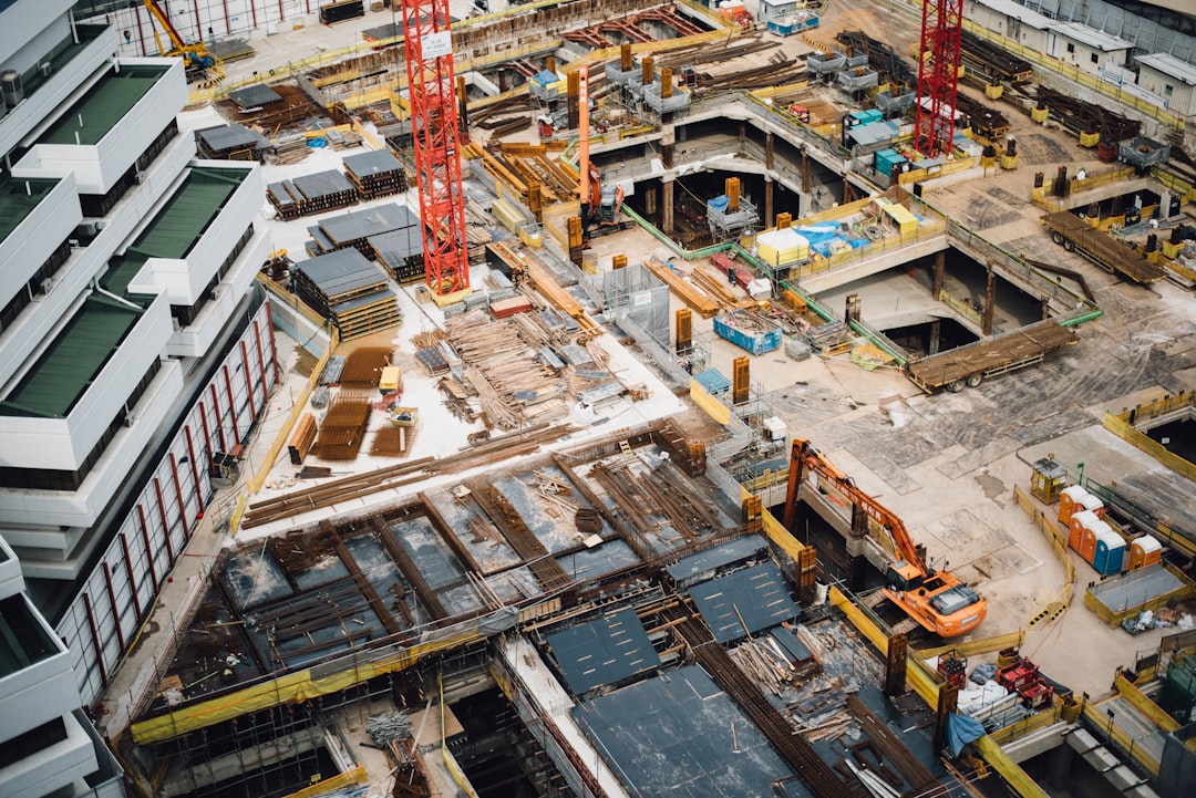 as-built survey services construction site with surveying equipment