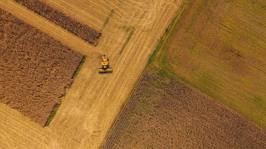 land leveling contractors working in field